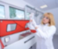 APT: Quality inspection - test for tube bursting strength Photo of an APT quality inspection employee - test for tube bursting strength