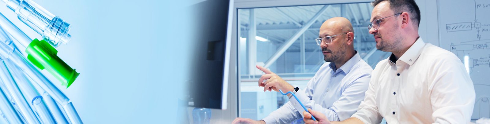 Example image: Two people discussing a project and product example