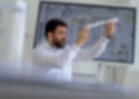 Engineering services tubes semicon Moodpicture: a APT employee holds a semicon plastic tube in his hand