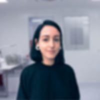 Training as a process mechanic at Masterflexgoup Woman smiling at camera