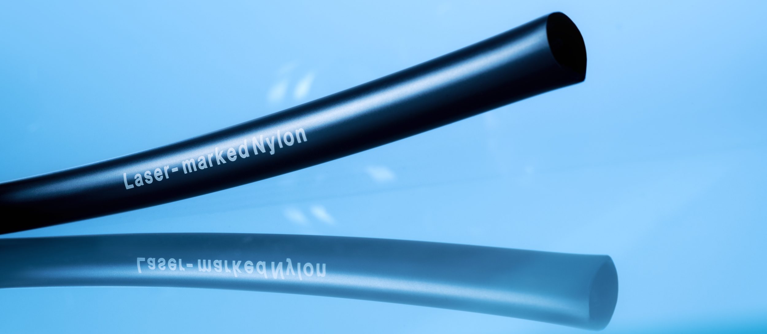 Novoplast Schlauchtechnik: abstract image of laser marked nylon tube