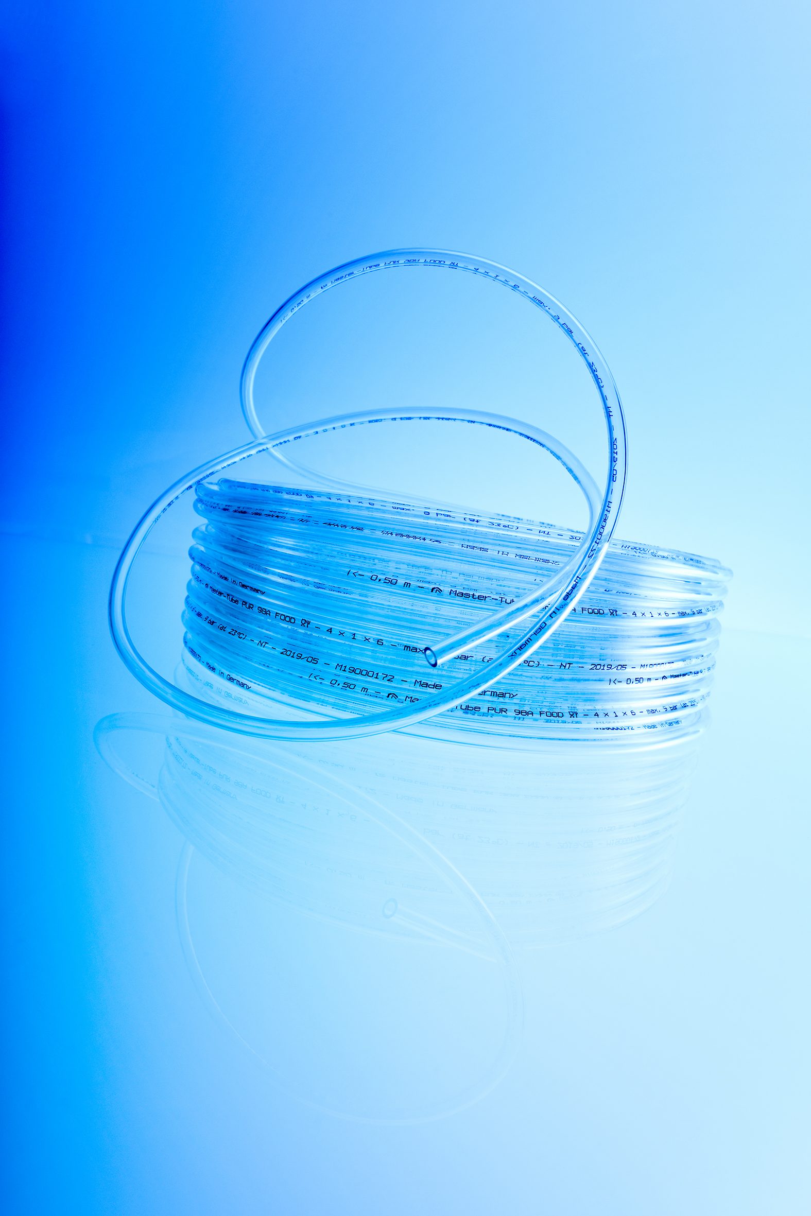 Eine Schlauchrolle mit kleinem Durchmesser und Kennzeichnung der Novoplast Schlauchtechnik.