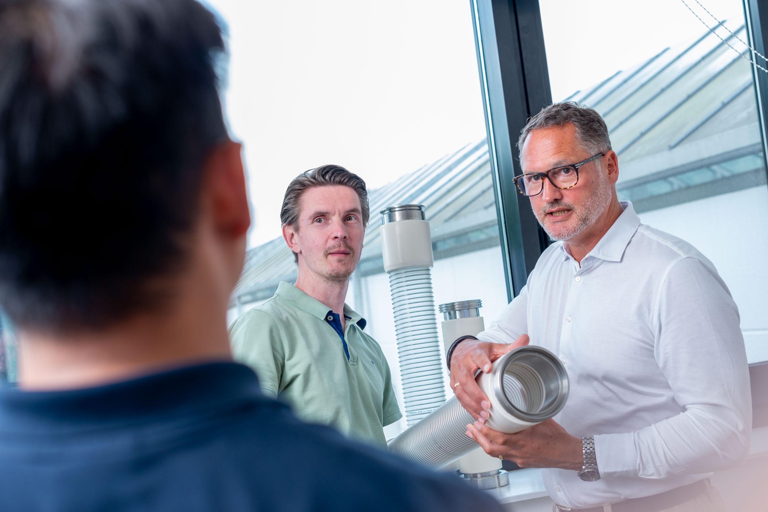 Mood picture: Masterduct sales and development colleagues in conversation